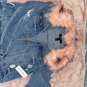 Jean jacket with removable pink fur